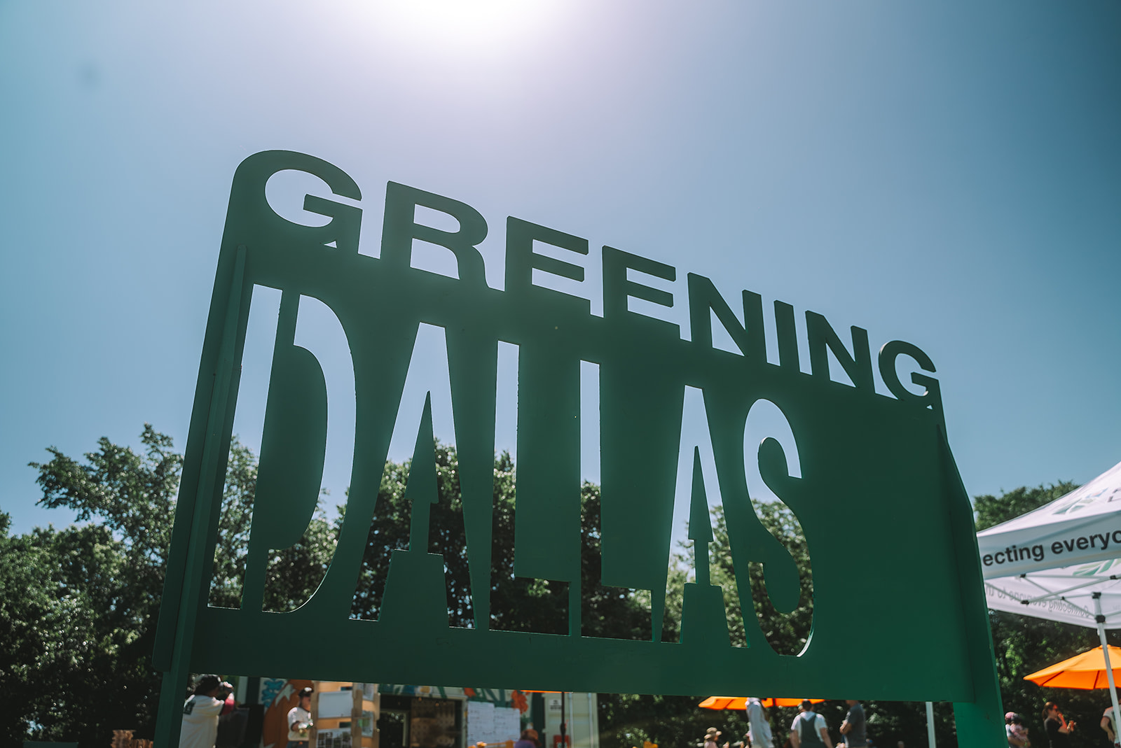 Greening Dallas sign